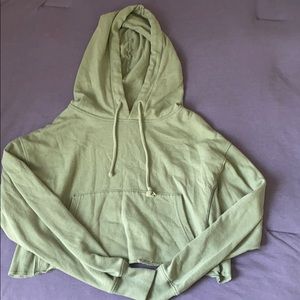 Oversized cropped green hoodie.